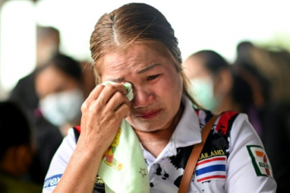 Families mourn Thai nursery dead ahead of king's visit.jpg