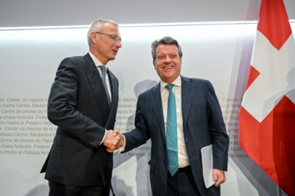 UBS takes over Credit Suisse in move to calm the markets.jpg