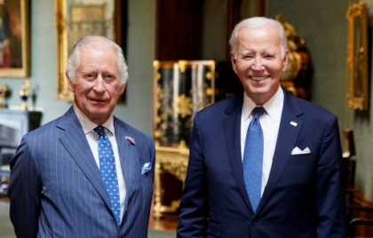 Biden takes tea and talks climate with King Charles III.jpg