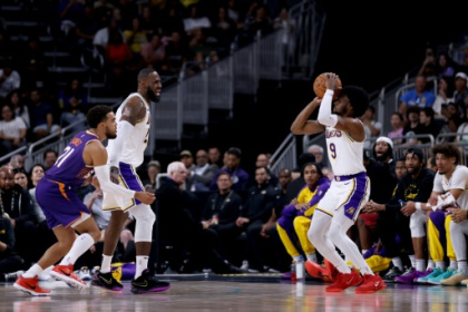 Family affair as LeBron, Bronny James make Lakers bow.jpg