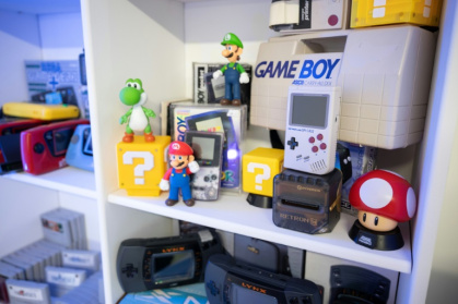 Retro video games and consoles displayed at the headquarters of RetroSix