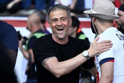 Luis Enrique in celebratory mood after PSG clinched the Ligue 1 title on Saturday