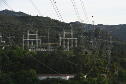 High-voltage pylons carry electricity from Spain to Portugal - MIGUEL RIOPA