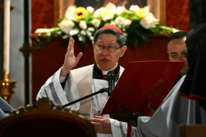 Cardinal Luis Tagle attending a rosary prayer at Santa Maria Maggiore Basilica in Rome on April 24, 2025 - Marco BERTORELLO