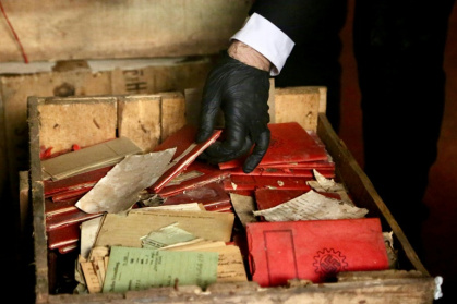 The crates contained Nazi-themed postcards, photographs, progapanda material, notebooks and party membership documents - Handout (AFP)