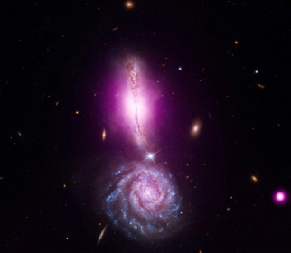 Two galaxies merging with each other -- a cataclysmic fate that could await our home Milky Way - - (AFP)