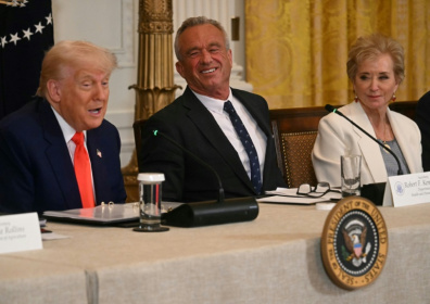 US President Donald Trump speaks as US Secretary of Health and Human Services Robert F. Kennedy Jr. (C), and US Secretary of Education Linda McMahon look on during a MAHA (Make America Healthy Again) Commission Event - Jim WATSON (AFP)