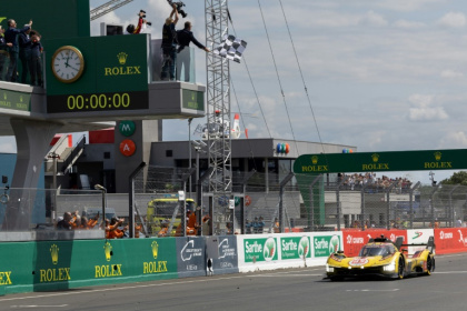 Robert Kubica takes his Ferrari across the line to win the 2025 Le Mans 24 Hours - Fred TANNEAU (AFP)