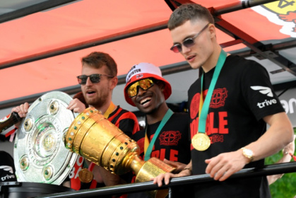 Florian Wirtz (right) inspired Leverkusen to a German league and cup double in 2023/24 - Roberto Pfeil (AFP)
