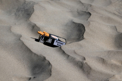 Beaches and parks are now covered by France's public smoking ban, a move met with mixed views - Fred TANNEAU (AFP)