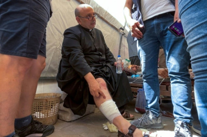 The priest of Holy Family Church in Gaza City, Father Gabriel Romanelli, was injured in the strike - Omar AL-QATTAA (AFP)
