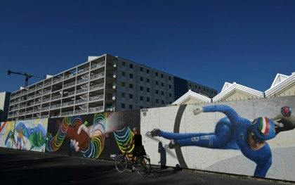 Ready to go: organisers say the finishing touches are being applied to the Olympic Village in Milan - Stefano RELLANDINI (AFP)