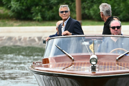 George Clooney travelling in style on Wednesday in Venice - Stefano RELLANDINI (AFP)
