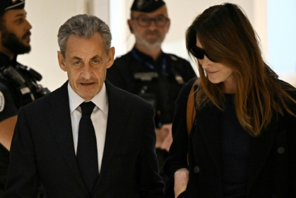 Former French president Nicolas Sarkozy was present with his wife Carla Brun for the verdict - JULIEN DE ROSA (AFP)