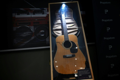 The guitars are part of the largest Oasis collection ever to come to auction - Justin TALLIS (AFP)