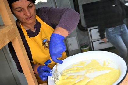 Branka Buha makes her creamy cheese - Elvis BARUKCIC (AFP)