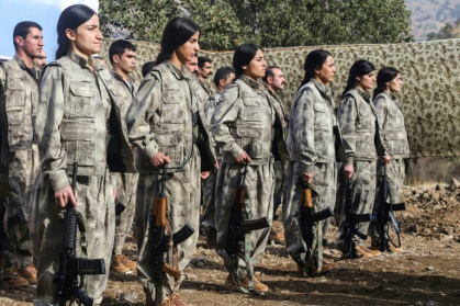 The Kurdistan Workers' Party (PKK) includes many women soldiers among its ranks, based alongside male fighters in northern Iraq - Safin HAMID (AFP)