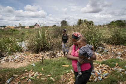 Many locals, including Helene Mvubu, say they have suffered from contaminated water discharges by a Chinese company - Glody MURHABAZI (AFP)