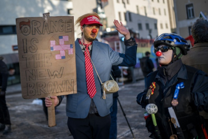 Protesters gather in Davos on Sunday ahead of the opening of the World Economic Forum - Fabrice COFFRINI (AFP)