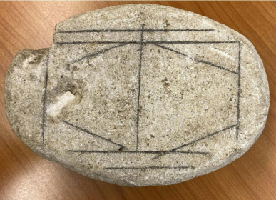 This handout picture shows a smooth, white stone dating from the Roman era in Het Romeins Museum, Heerlen that has long baffled researchers - Handout (AFP)