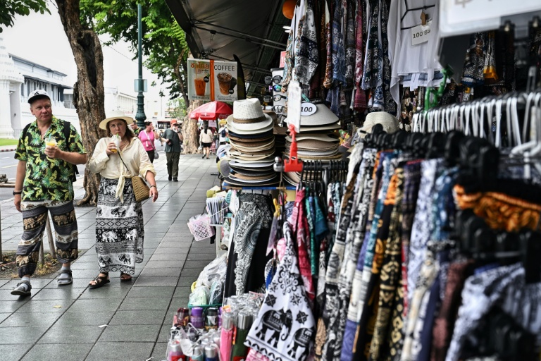 Tourists in Thailand plan for coming cuts to visa-free stays
