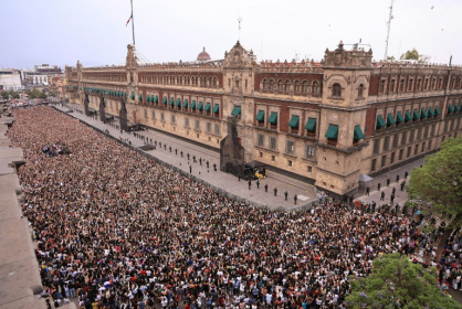 In this handout picture released by Mexico's presidencial press office, some 50,000 fans of South Korea's K-pop band BTS came to see the band at the Palacio Nacional in Mexico City - Handout (AFP)