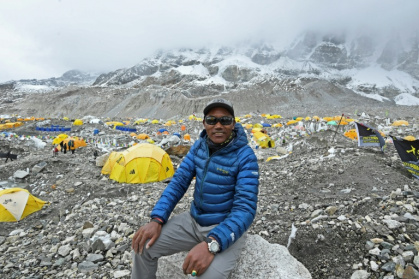 A Nepali climber dubbed the "Everest Man", Kami Rita Sherpa, scaled Mount Everest for a record 32nd time Sunday - Prakash MATHEMA (AFP)