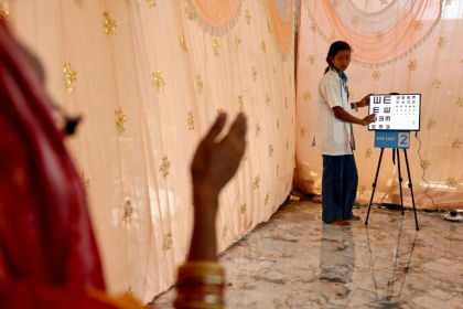 An optometrist conducts an examination at a screening camp in Cuttack's Maniabandha village - Niharika KULKARNI (AFP)