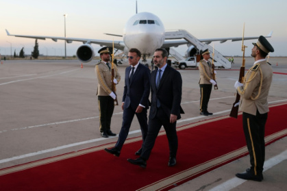 Emmanuel Macron is visiting with Syria trying to rebuild its international reputation - Ludovic MARIN (AFP)