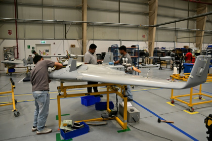 Employees work on the assembly unit of Shadow 50 drones inside the facility of 'EDGE Group', an Emirati advanced technology and defence conglomerate, in Abu Dhabi - Giuseppe CACACE (AFP)