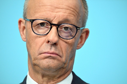German Chancellor Friedrich Merz speaks to the press, one day after his party suffered a crushing state election defeat at the hands of the far-right AfD - RALF HIRSCHBERGER (AFP)