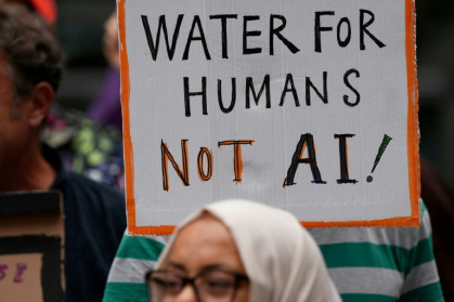 Protesters against a water- and energy-hungry data centre planned for Brick Lane, London - CARLOS JASSO (AFP)